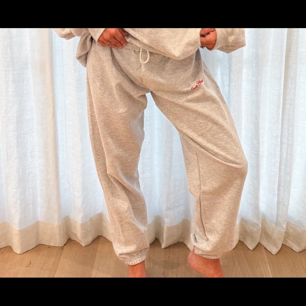 NWOT Grey women’s sweatpants that say love you more on leg